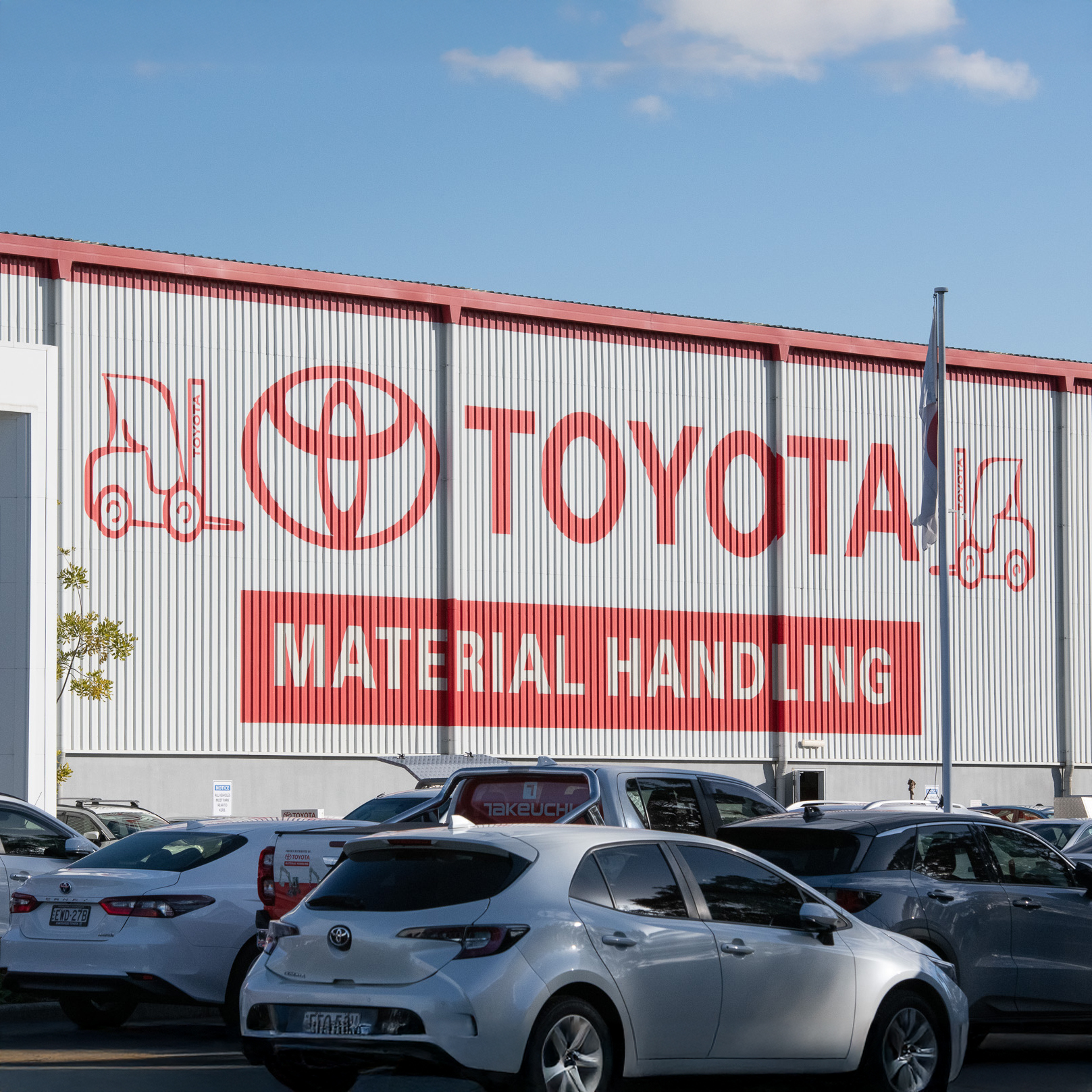 Large scale painted wall signage - hover