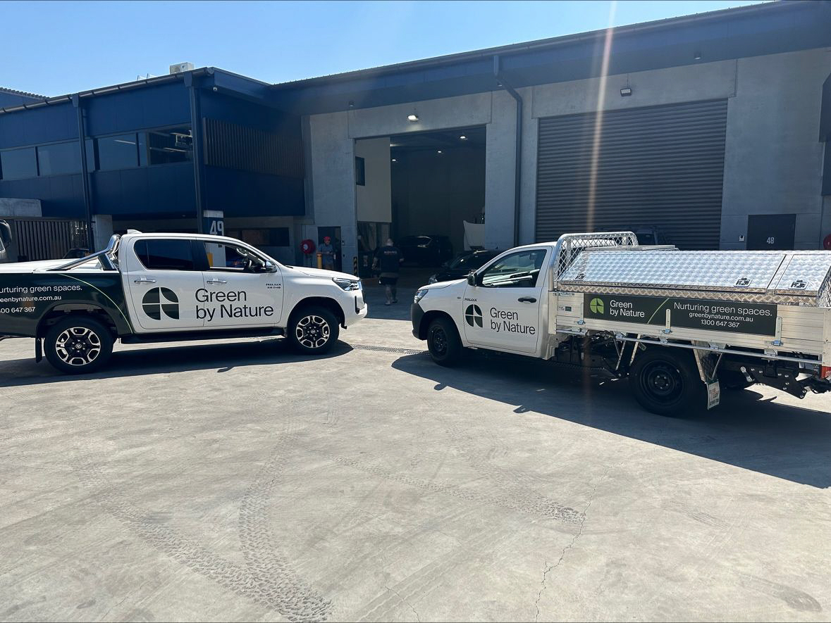 Green by Nature landscaping van with full brand wrap