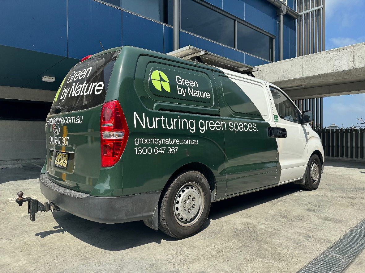 Green by Nature service vehicle with professional graphics