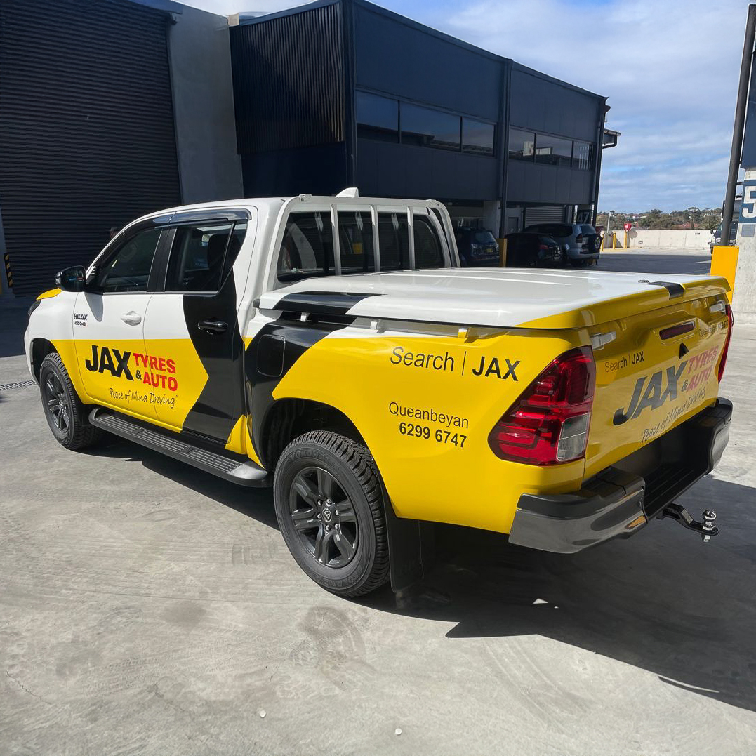 Fleet vehicle with professional wrap - hover