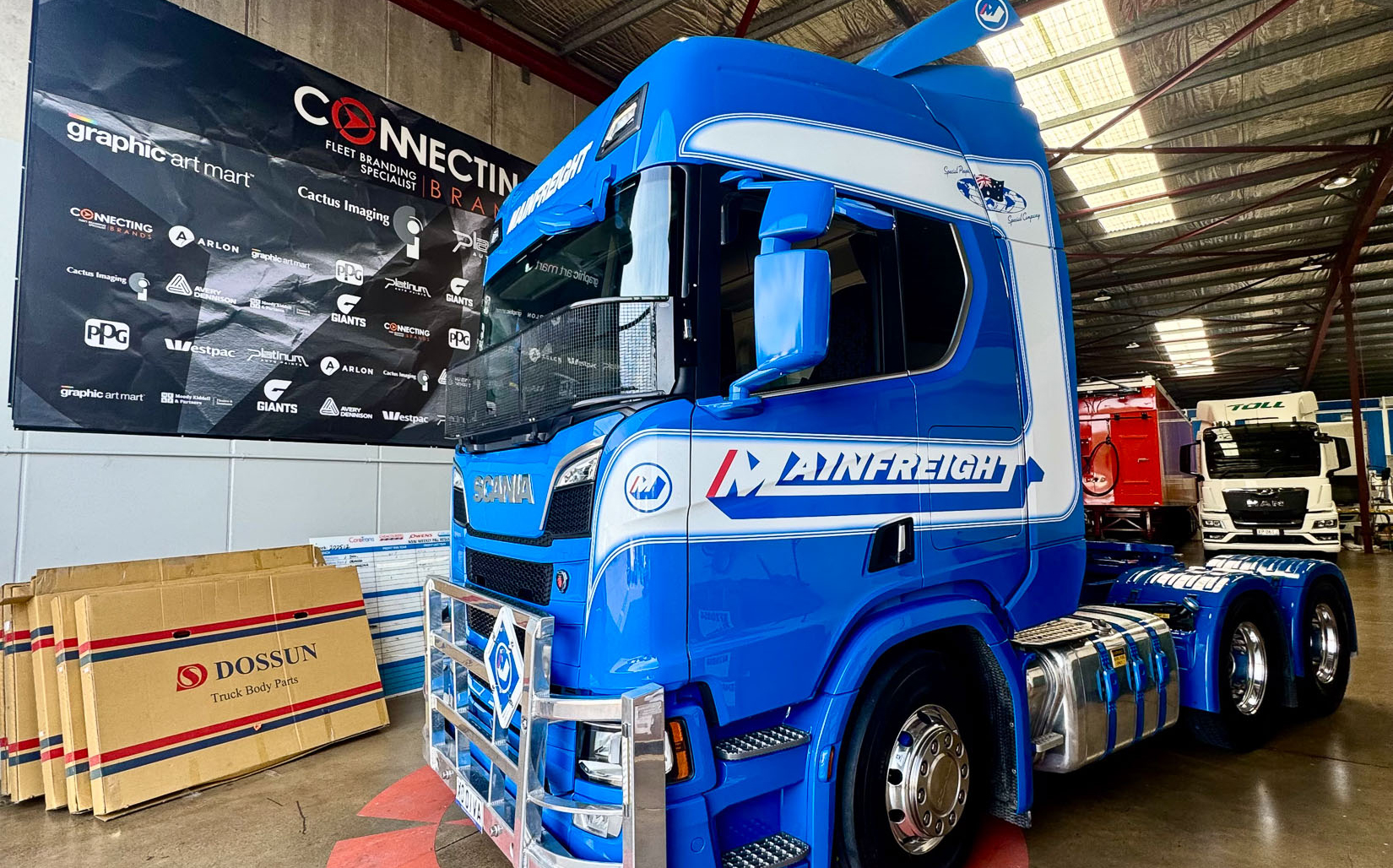 Mainfreight delivery van with full vehicle wrap