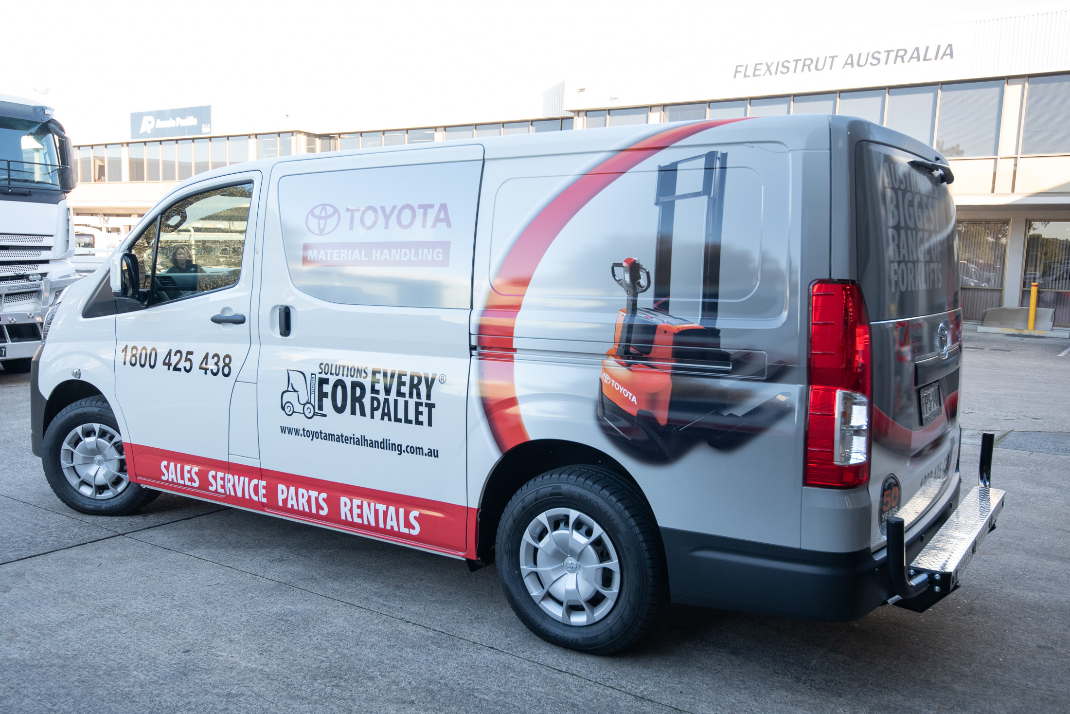 Toyota Material Handling Takeuchi branded forklift service van